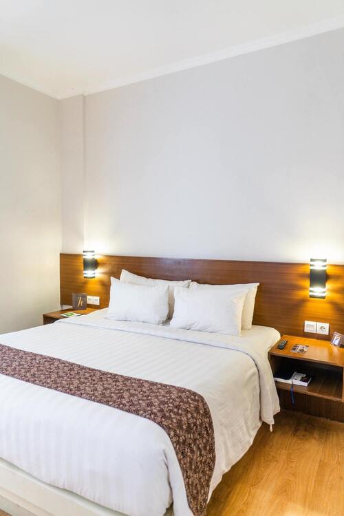 Chambre de l'hotel Tout bleu et blanc